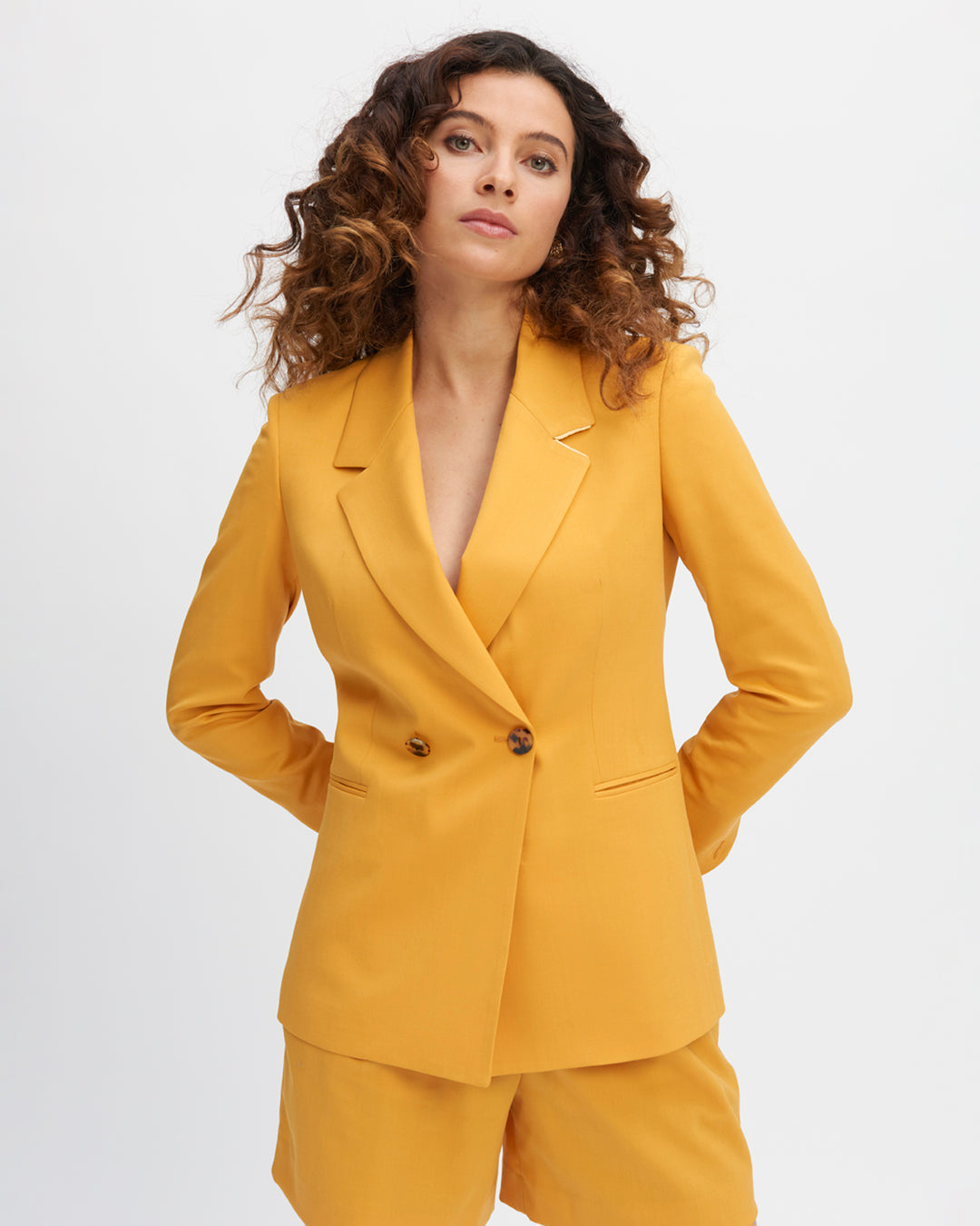 Long-sleeved jacket-yellow-cropped-and-curved-sleeved-collar-detachable-belt-toned-on-toned-two-short-slits-on-the-back-for-a-pretty-tumble